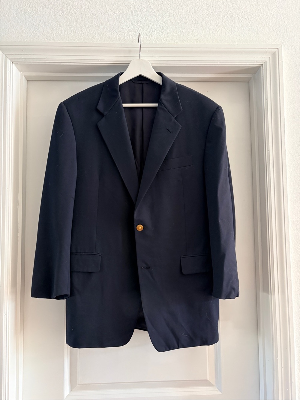 Saks Fifth Avenue navy blue blazer. Hickey-Freeman Collection.